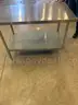 Refrigerators, drink cooler, chairs, safe, coffee maker, stainless steel tables, frozen drink machine.