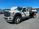 2012 Ford F-550 4x4 Diesel Roll Off Hook Lift Flatbed Dump Truck (ID #39757) (Off-Site) (25-1300) 13400