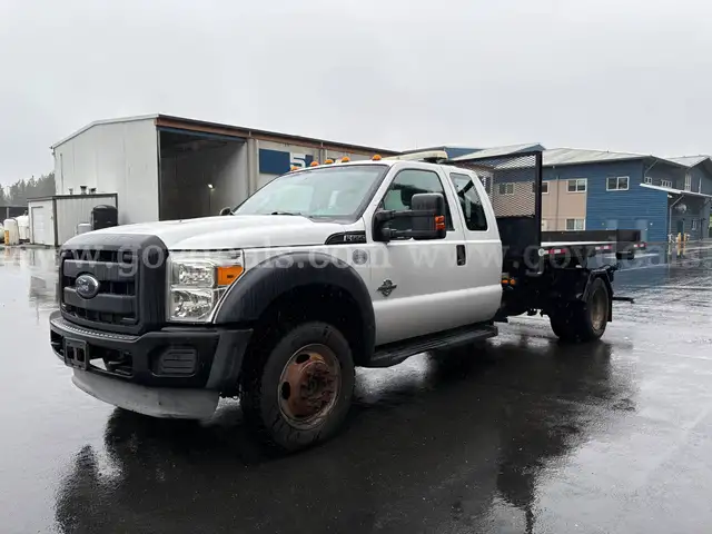 2012 Ford F-550 | Extended Cab | 6-Ton Hook Lift Flatbed | 4x4 (ID #43662) (Off-Site) (25-4525) 13400