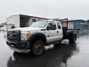 2012 Ford F-550 | Extended Cab | 6-Ton Hook Lift Flatbed | 4x4 (ID #43662) (Off-Site) (25-4525) 13400