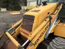 1999 New Holland 655E 4WD Backhoe w/ 4-in-1 Bucket (ID# 44317) (GVL) (25-3335) 405