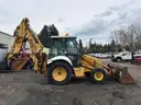 1999 New Holland 655E 4WD Backhoe w/ 4-in-1 Bucket (ID# 44317) (GVL) (25-3335) 405