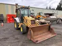 1999 New Holland 655E 4WD Backhoe w/ 4-in-1 Bucket (ID# 44317) (GVL) (25-3335) 405