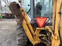 1999 New Holland 655E 4WD Backhoe w/ 4-in-1 Bucket (ID# 44317) (GVL) (25-3335) 405