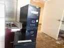 4 File Cabinets, 1- Black 4 drawer 1- Black 2- Drawer 1- wood and 1- 4 Drawer Burgandy