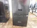 4 File Cabinets, 1- Black 4 drawer 1- Black 2- Drawer 1- wood and 1- 4 Drawer Burgandy