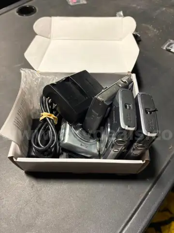 4 Canon Handheld cameras