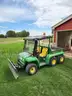 John Deere Gator with Plow Attachment