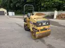 Caterpillar Double Smooth Drum Vibratory Compactor Roller