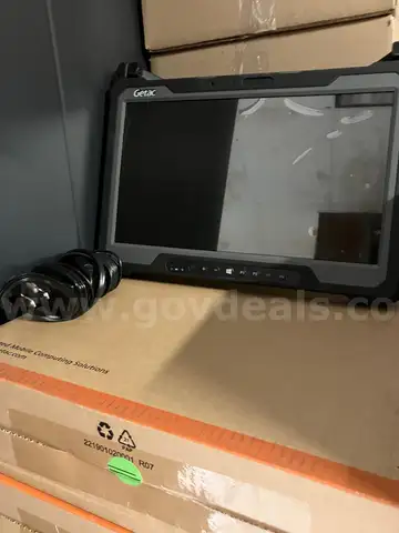 12 sets of Getac Computers A140 G1 with wall charger cable