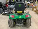 John Deere X750 Diesel Ridding Lawn Mower with front and rear hydraulics.