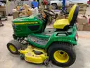 John Deere X750 Diesel Ridding Lawn Mower with front and rear hydraulics.