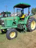 1999 John Deere 6210 Tractor with Rhino Boom Cutter Attachment