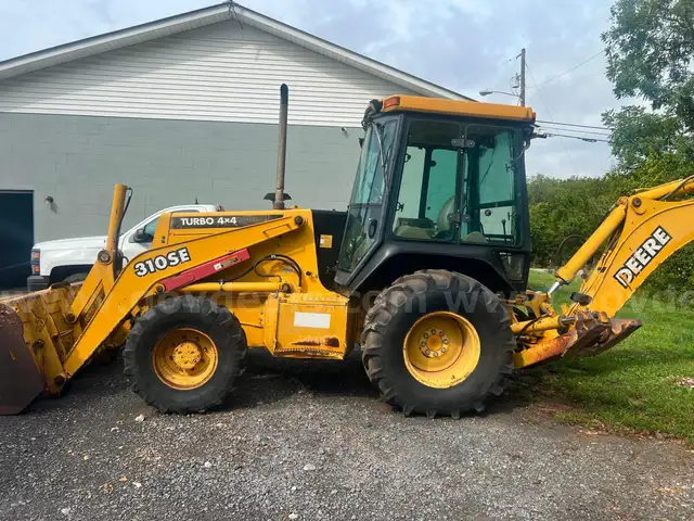 2000 John Deere 310 SE 4x4 cab Backhoe