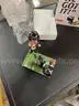 Lot of 12 Retired UC Football Bobbleheads