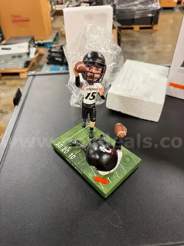 Lot of 12 Retired UC Football Bobbleheads