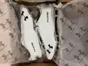 Lot of Approximately 100 Under Armour Cleats