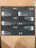 Lot of Approximately 100 Under Armour Cleats