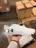 Lot of Approximately 100 Under Armour Cleats