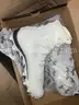 Lot of Approximately 68 Under Armour Cleats