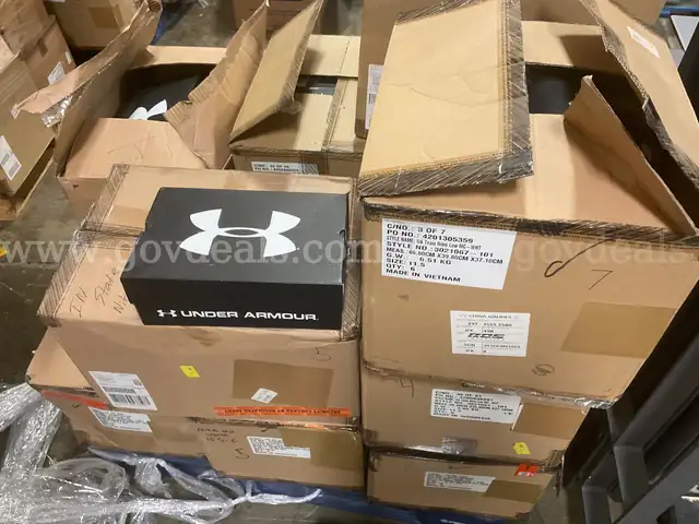 Lot of Approximately 68 Under Armour Cleats