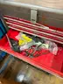 Multi-tiered tool cart with assorted items