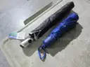 Lot of 2ea black and blue collapsing umbrellas