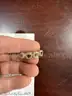Sterling Silver Ring with Diamonds and 10k Gold Teeth &#x22;Grill&#x22; Set with Diamonds