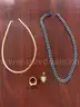 Ring, Two Necklaces and a Pendant
