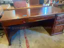 One Dark Brown Office Desk