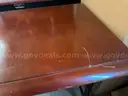 Long Dark Brown Wooden Rolling Table