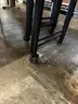 Long Dark Brown Wooden Rolling Table