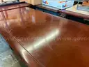 Long Dark Brown Wooden Rolling Table