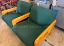 A Lot of 2 Green Cushioned Chairs