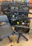 A Lot of 24 Small Black Rolling Chairs