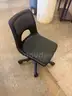 A Lot of 24 Small Black Rolling Chairs