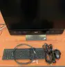 A Dell Precision 5720 All-in-One with Power Cable