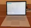 A Microsoft Surface Book 2 with Charging Cable