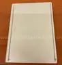 A Microsoft Surface Book 2 with Charging Cable