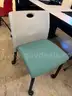 Green Seated Rolling Chair
