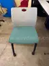Green Seated Rolling Chair