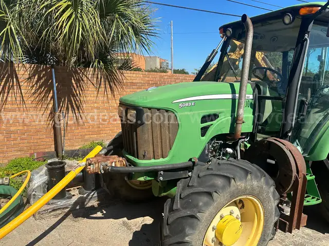 John Deere Tractor 503E with cutting head