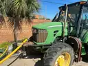 John Deere Tractor 503E with cutting head