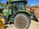 John Deere Tractor 503E with cutting head