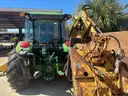 John Deere Tractor 503E with cutting head