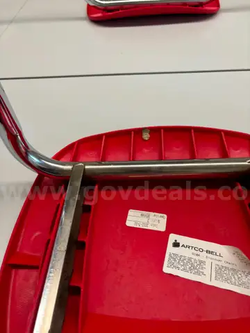 Red Plastic Discover Chair with Chrome Legs