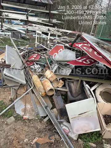 Lot of Damaged Road Signs and Bent Poles