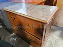 Wooden 2 drawer lateral cabinet w/glass top