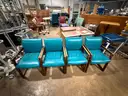 Set of four blue chairs.