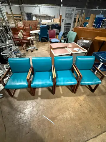 Set of four blue chairs.
